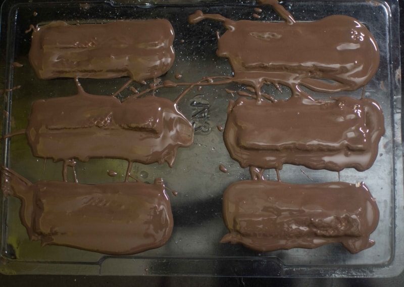 Cover wafers with chocolate